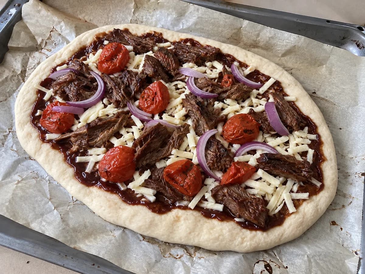 BBQ Brisket with Roasted Tomatoes before baking