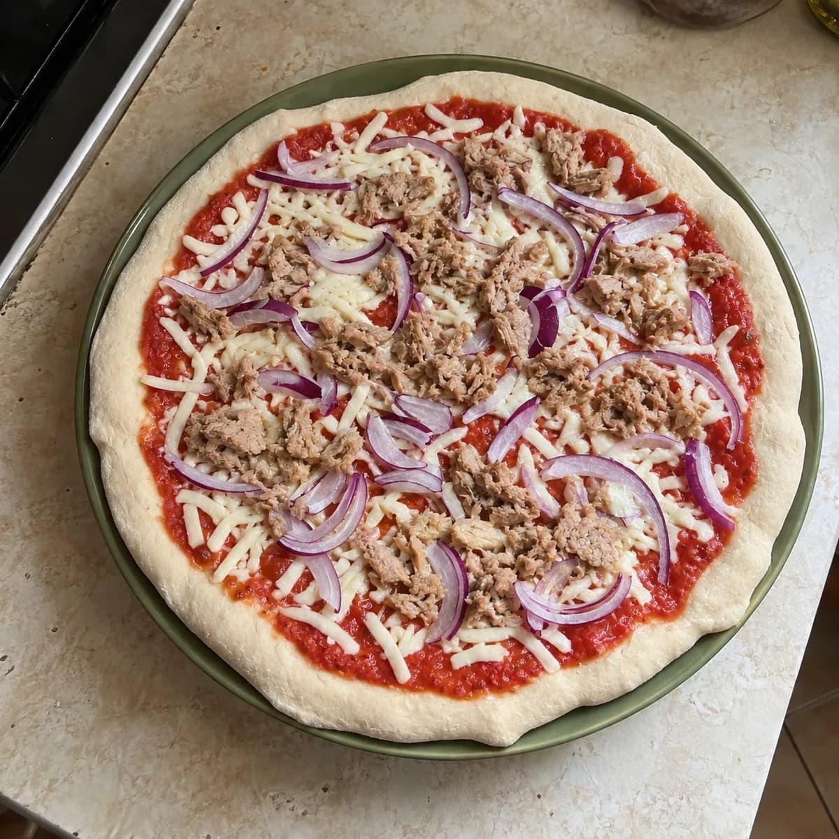 Tonno e cipolla före gräddning